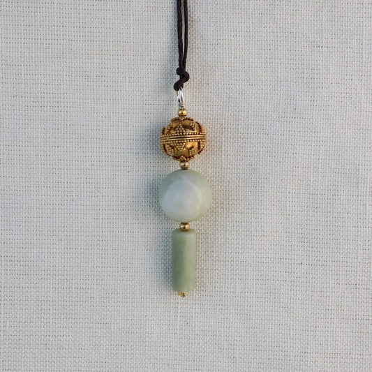 Elegant Nephrite Jade Pendant with Gold-Plated Silver Details